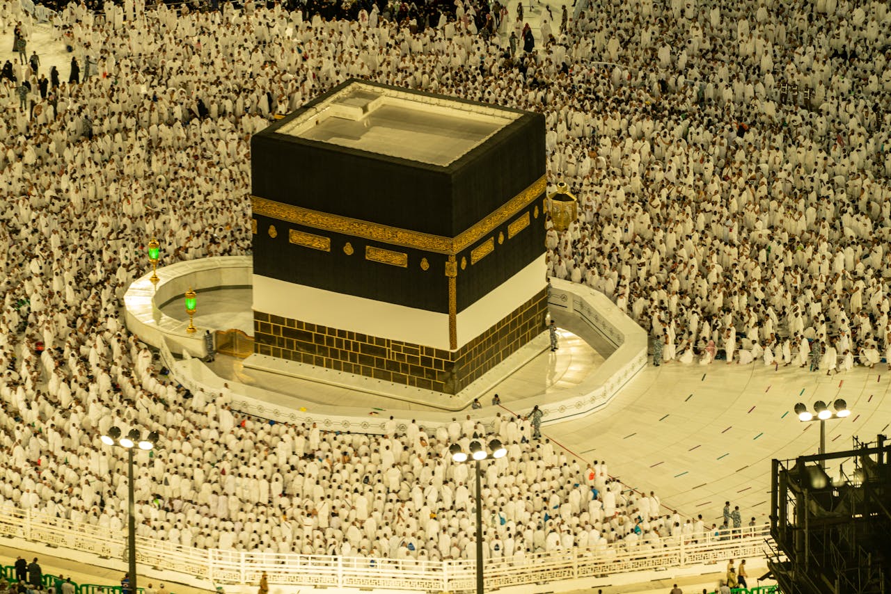 Aerial view of the Kaaba in Mecca, Saudi Arabia, with thousands of pilgrims during Hajj season.